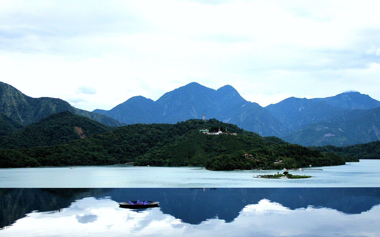 infinity-edge pool merging into a lake view