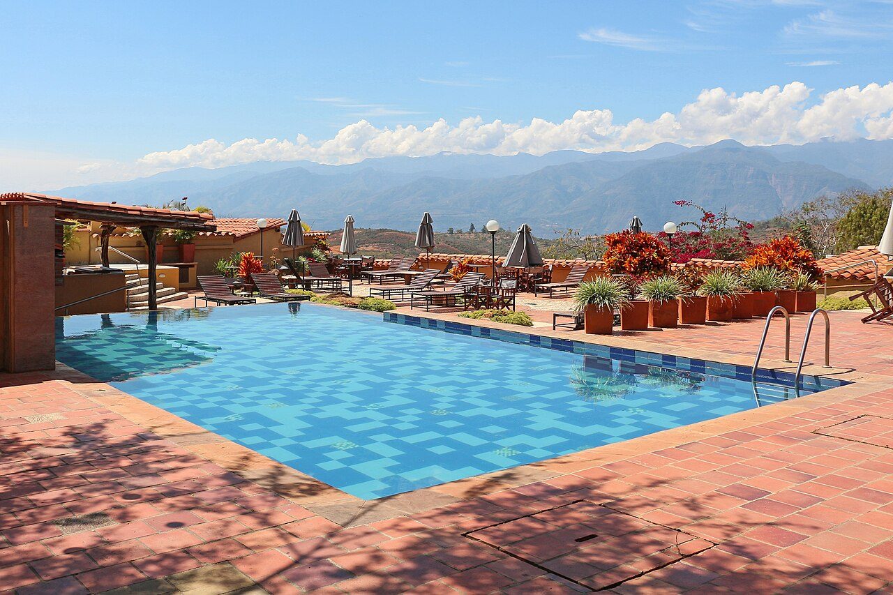 hotel courtyard pool lined with loungers